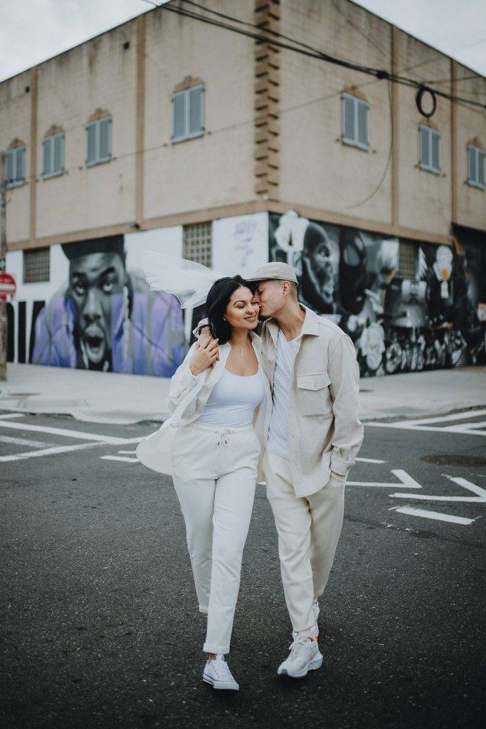 Couple during urban elopement in east williamsburg brooklyn