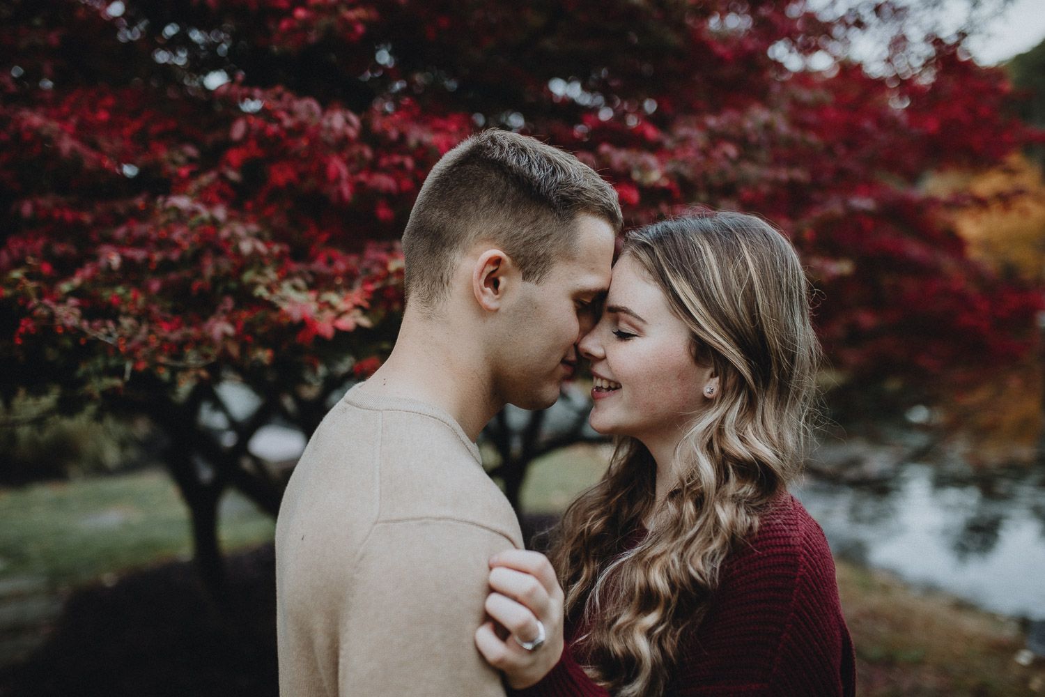 Couple during fall engagement photoshoot in west point