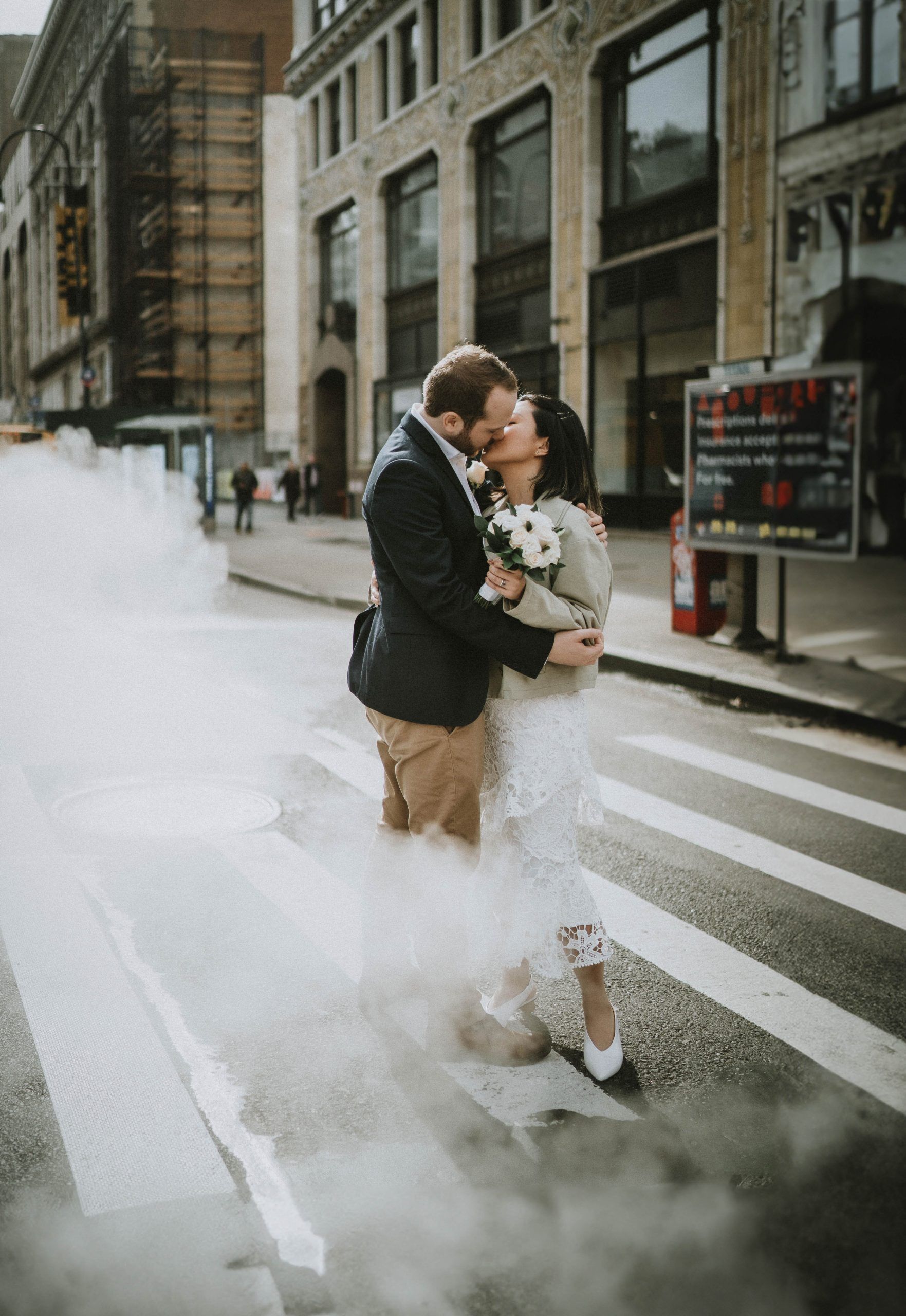 Bride and groom kissing in nyc during elopement