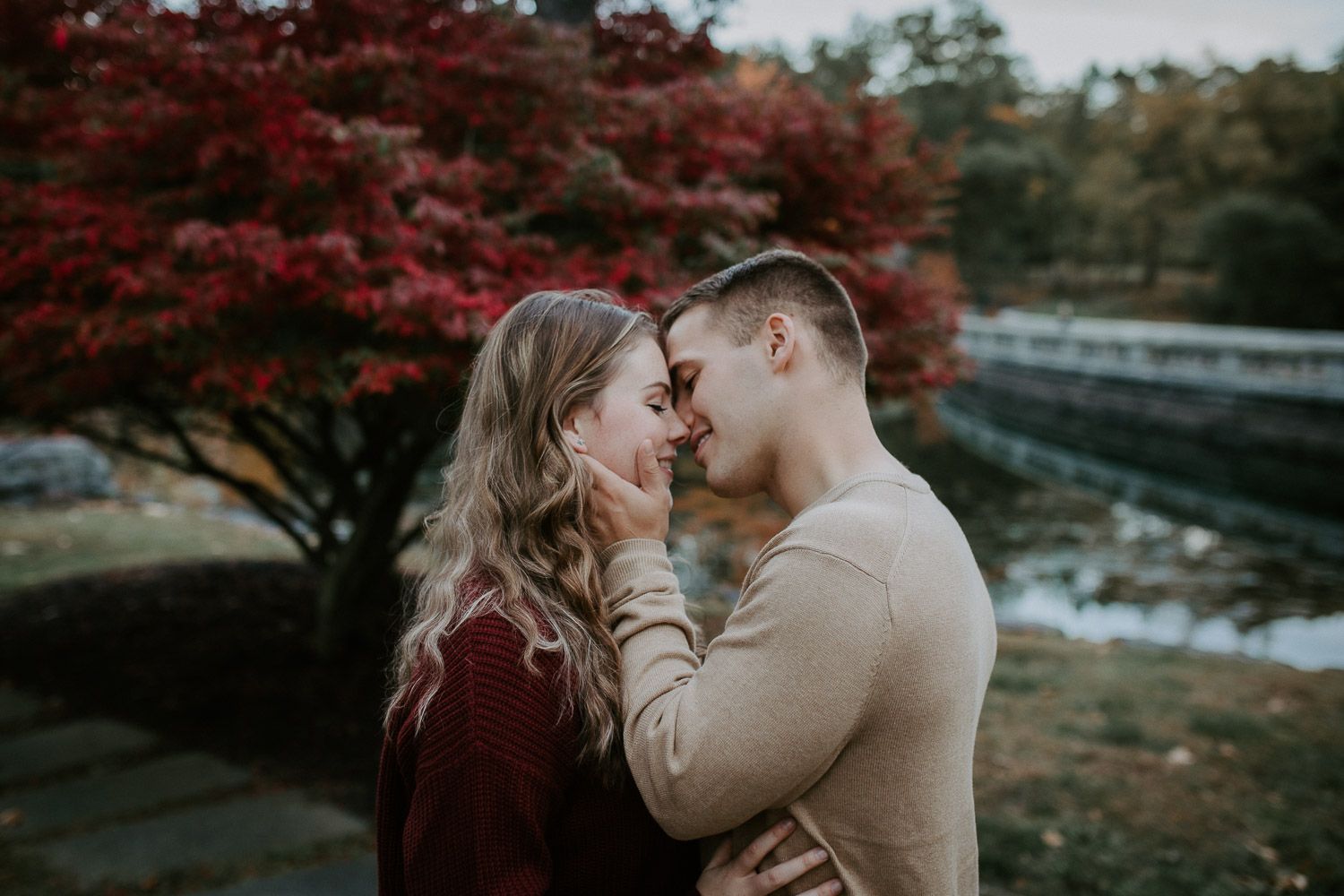 Couple during fall engagement photoshoot in west point
