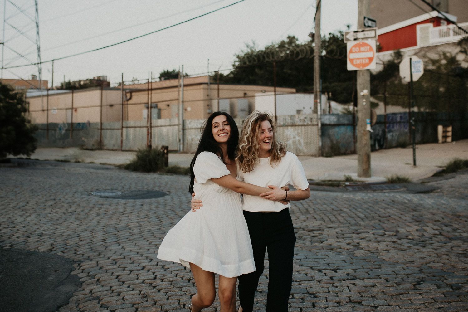Couple during queer engagement session in brooklyn