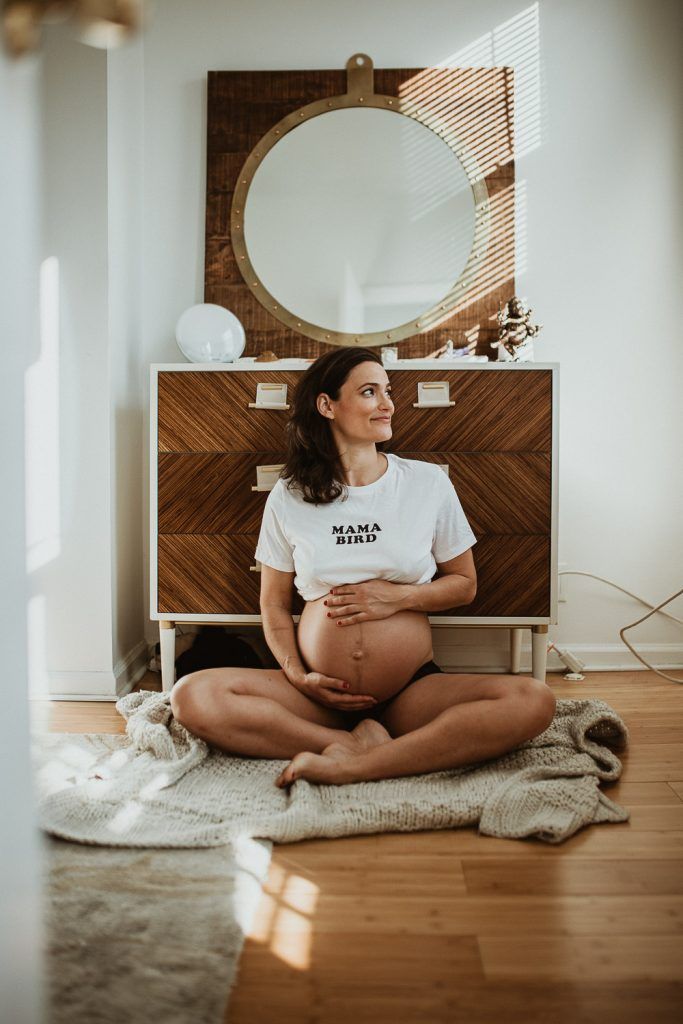 Pregnant woman during maternity photoshoot at home in brooklyn