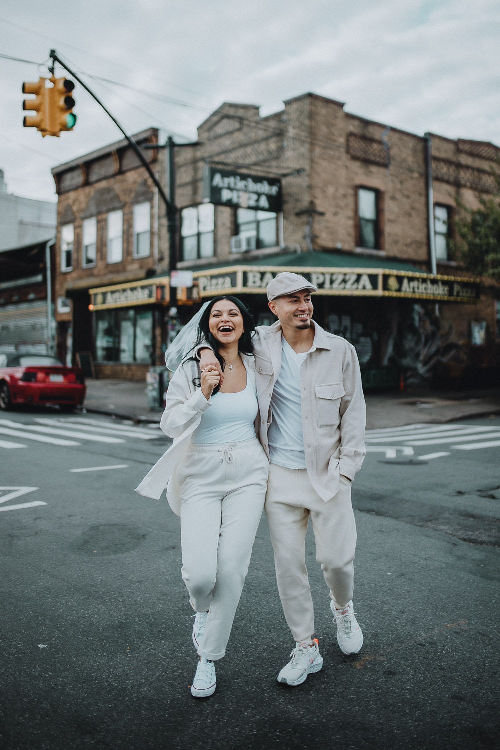 Couple during urban elopement in east williamsburg brooklyn