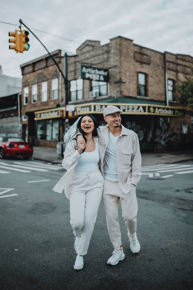 Couple during urban elopement in east williamsburg brooklyn