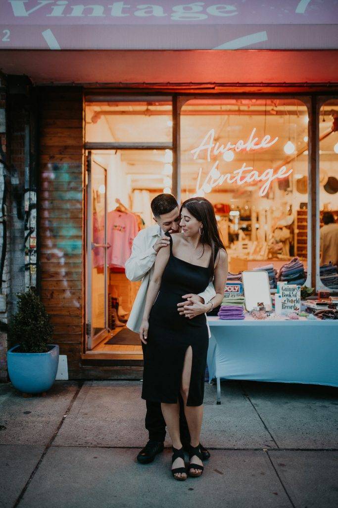 Couple during engagement photo session in williamsburg brooklyn