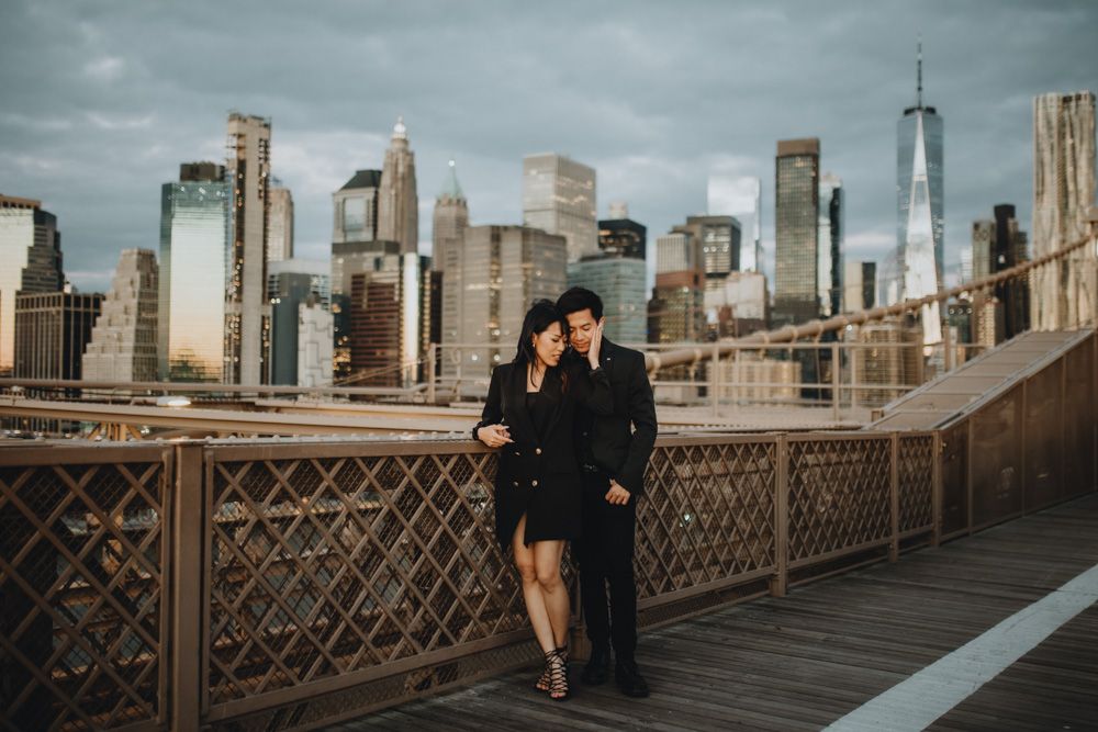 Couple during elopement photoshoot at golden hour on brooklyn bridge