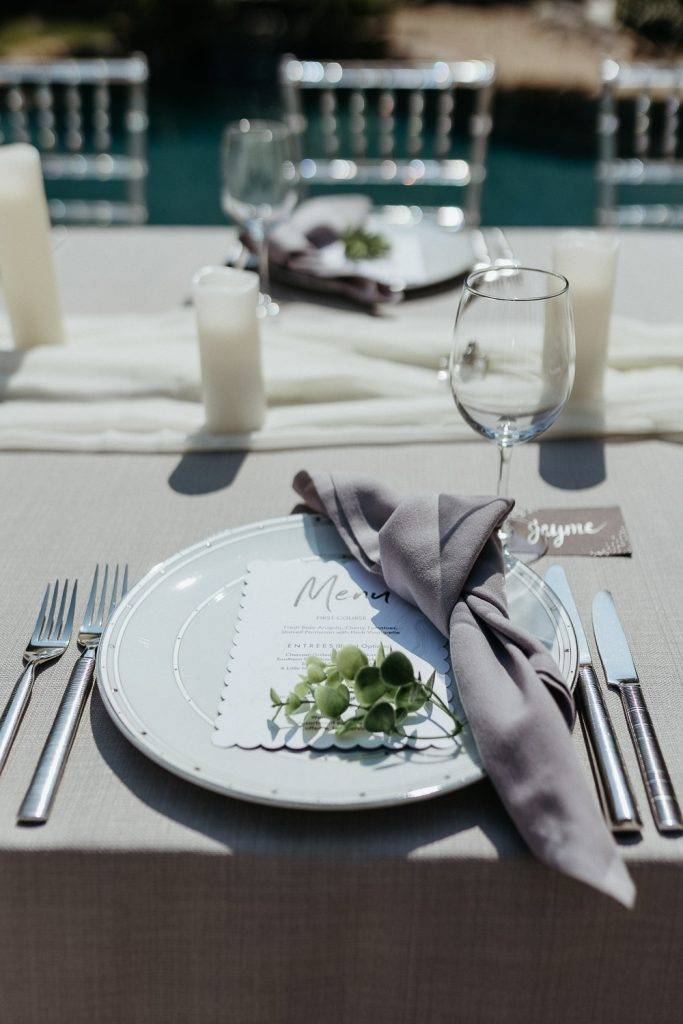 Menu on table at backyard wedding in the hamptons