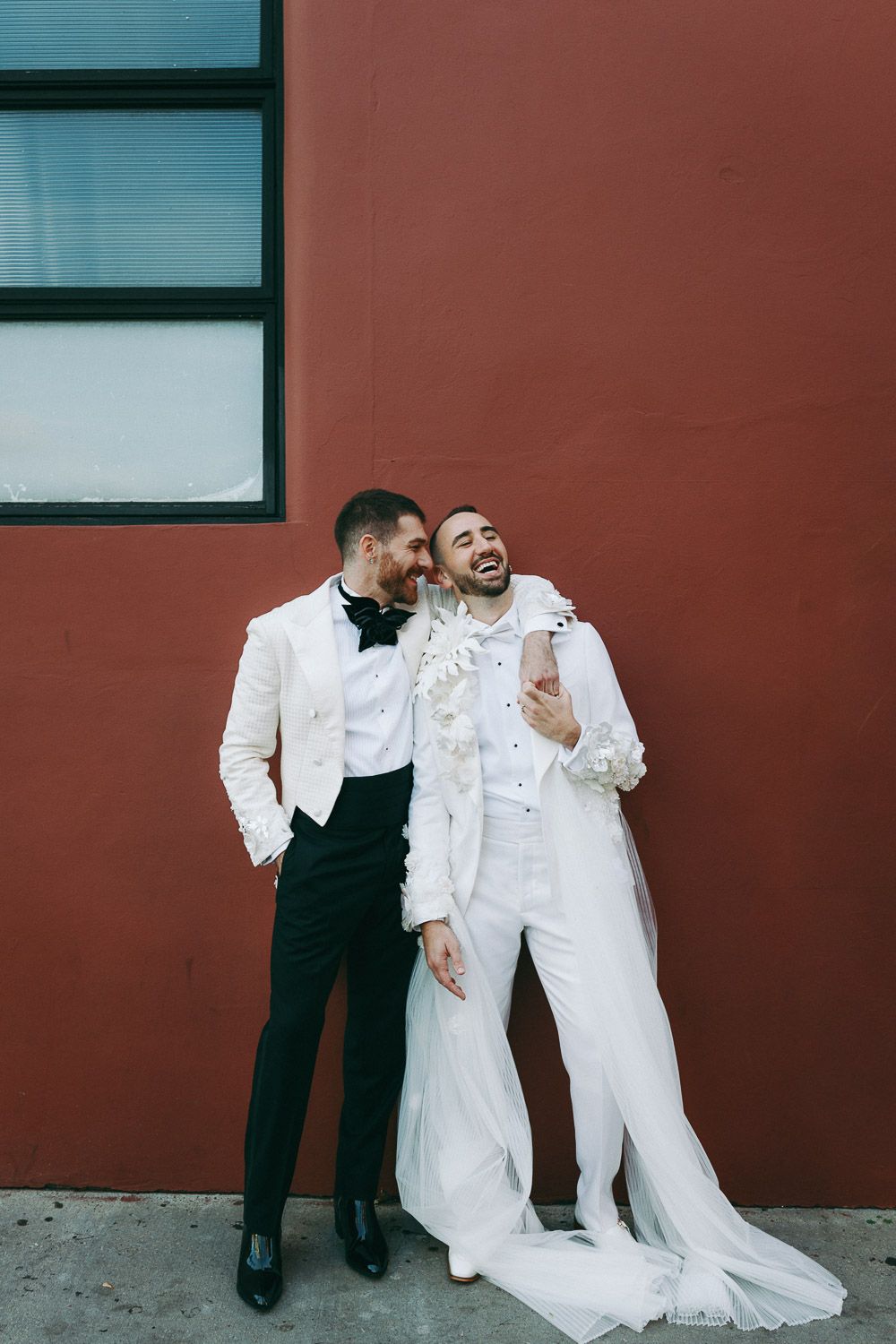 Two stylish grooms at nyc gay wedding