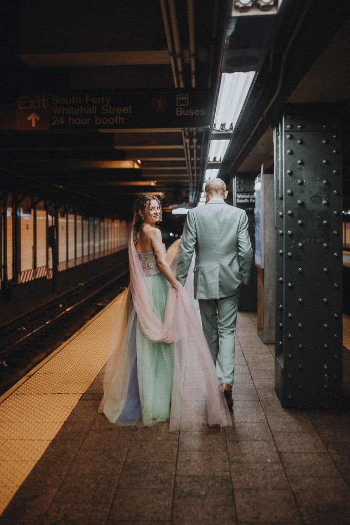 Bride and groom in nyc subway - by Lucie B. Photo brooklyn wedding photographer