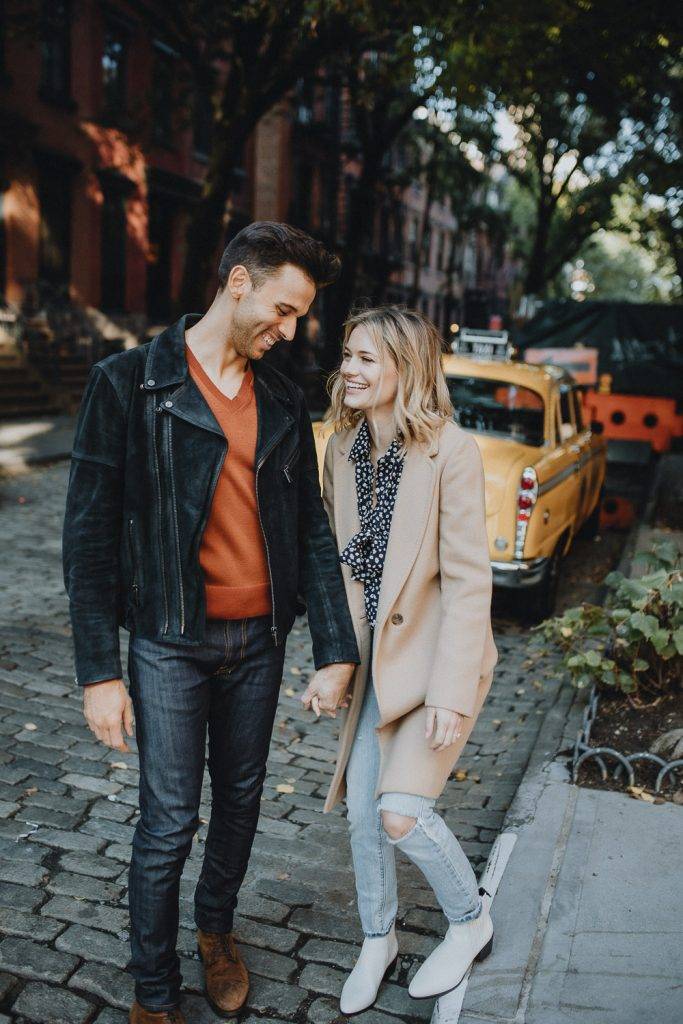 Couple by old taxi cab during nyc engagement photoshoot