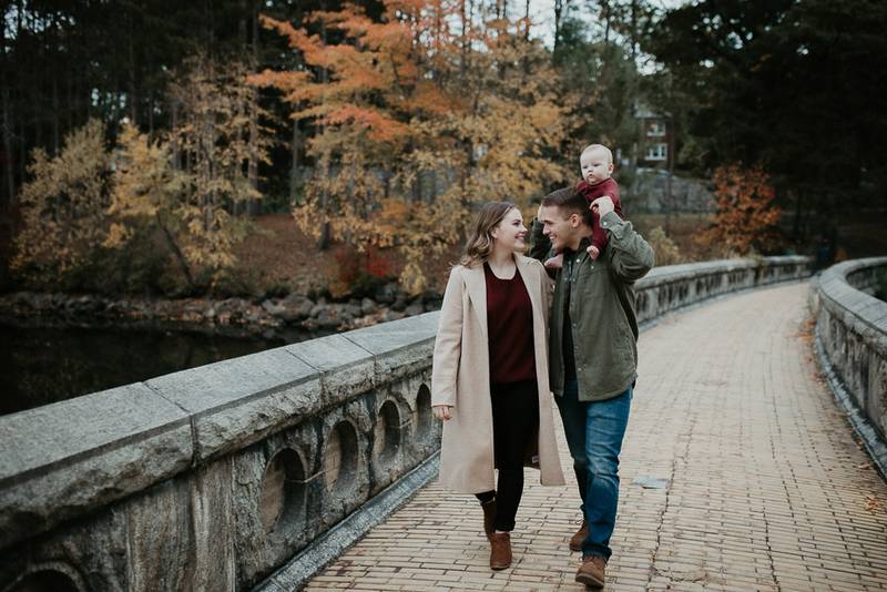 Parents and baby during fall family session in west point