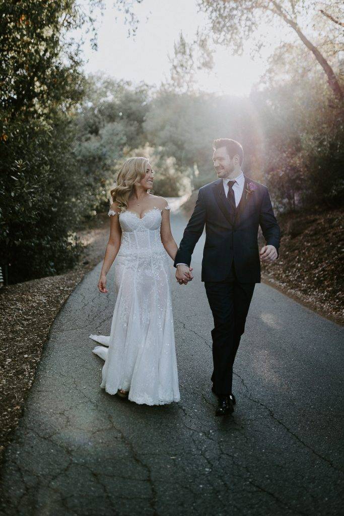 Bride and groom at golden hour in hills of los angeles