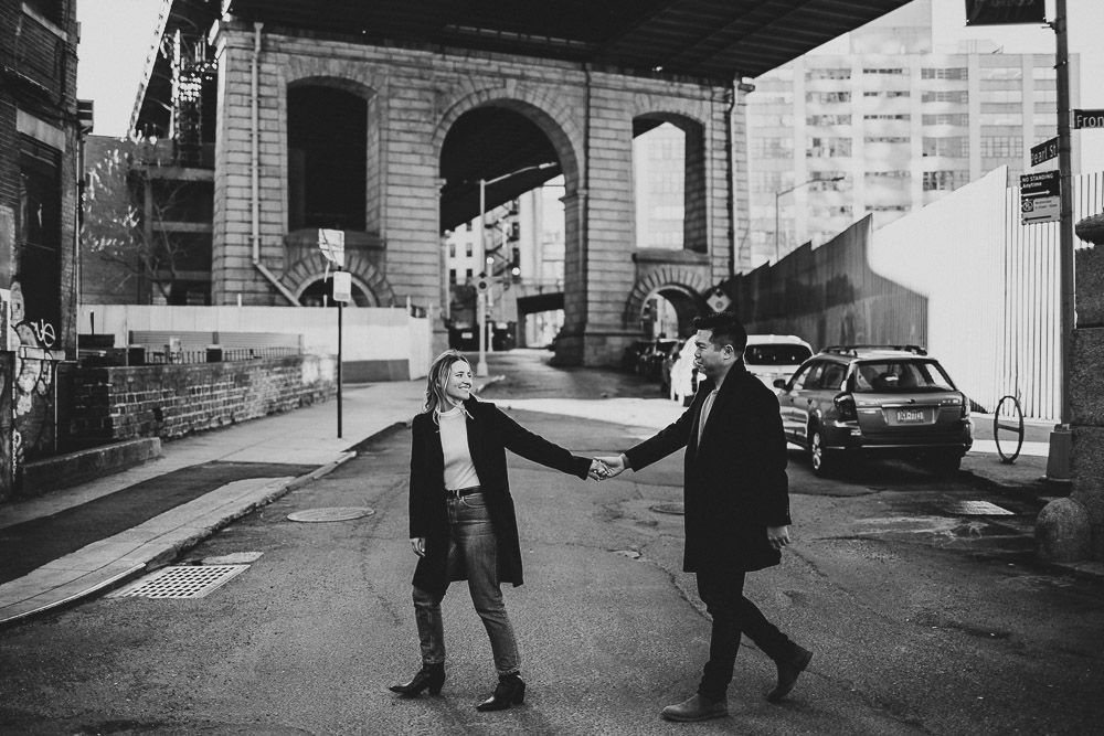 Couple during engagement photoshoot in dumbo brooklyn