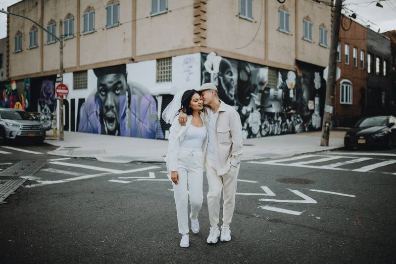 Couple during urban elopement in east williamsburg brooklyn