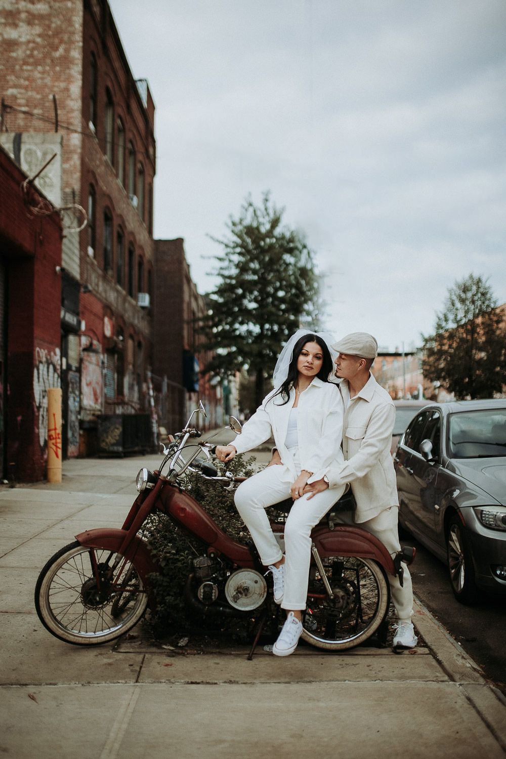 Couple during urban elopement in east williamsburg brooklyn