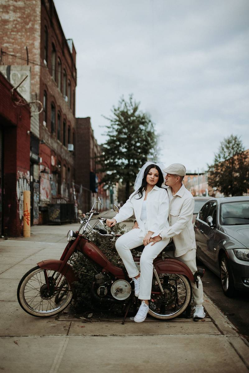 Couple during urban elopement in east williamsburg brooklyn