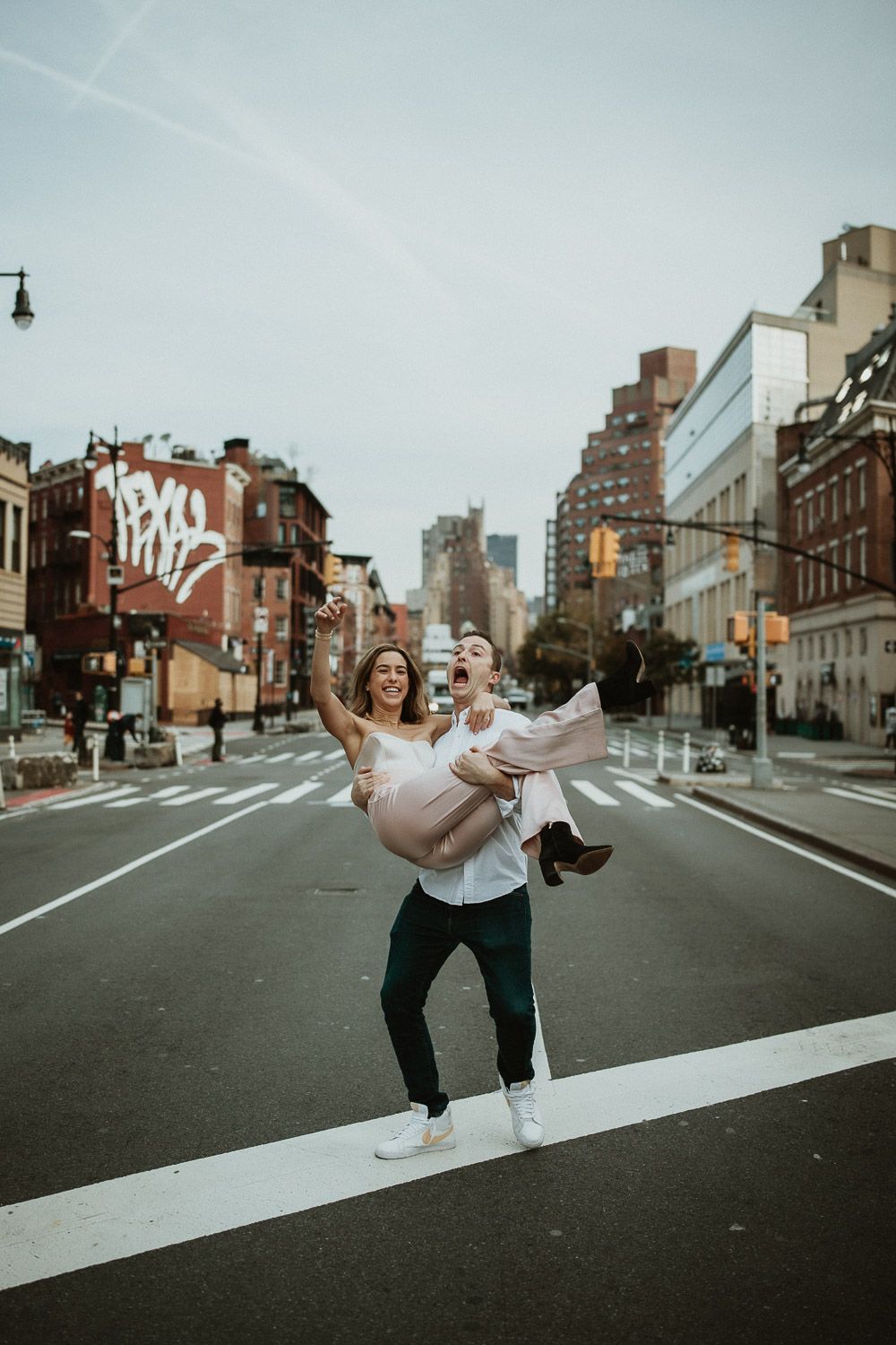 Goofy couple during engagement photoshoot in the west village of nyc