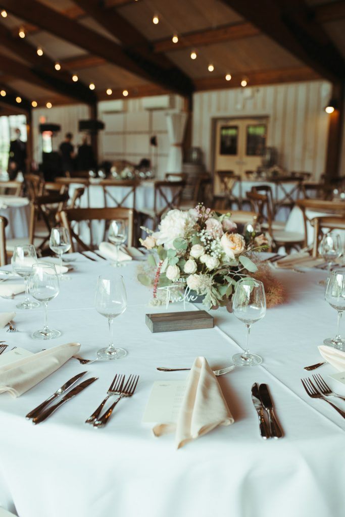 Table decorations at red maple vineyard wedding reception