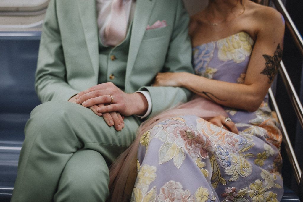 Bride and groom in nyc subway - by Lucie B. Photo brooklyn wedding photographer