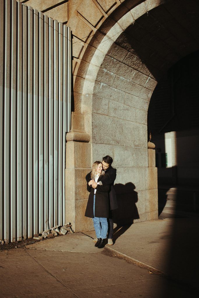 Couple during engagement photoshoot in dumbo brooklyn