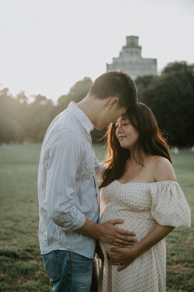 Expecting couple in prospect park at golden hour during maternity session