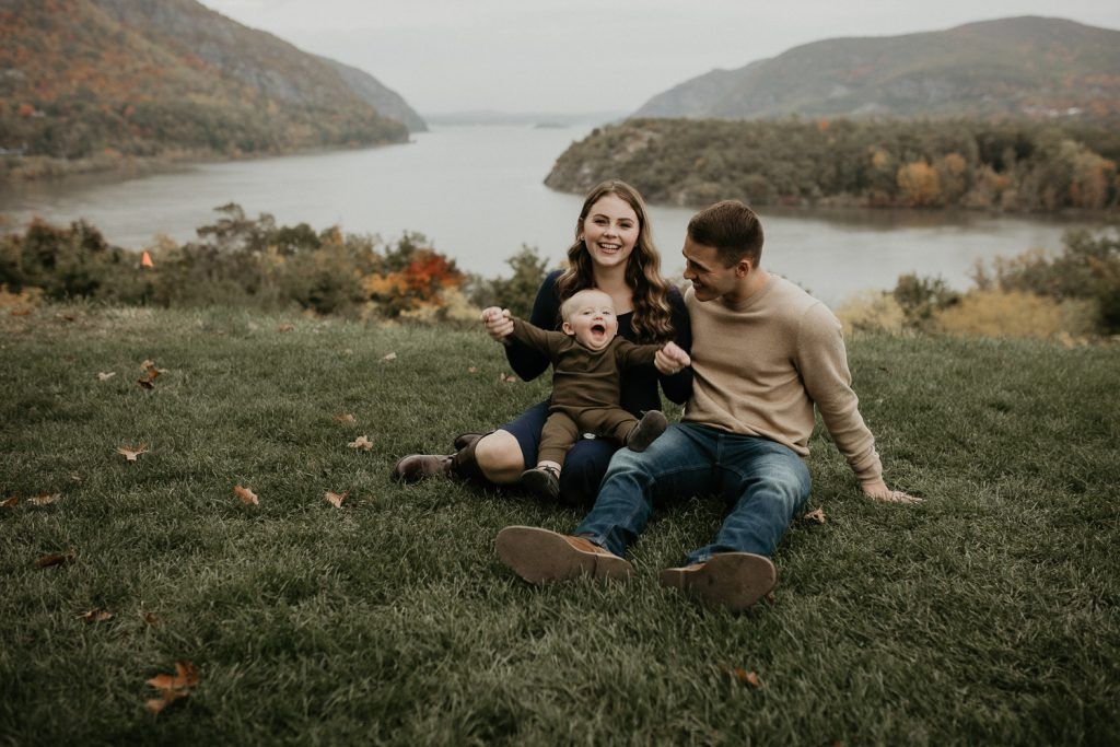 Parents and baby during fall family session in west point