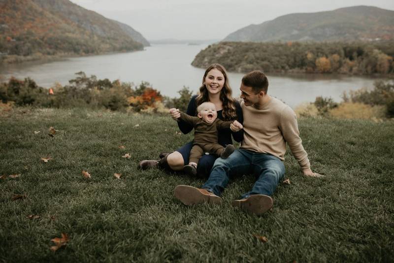 Parents and baby during fall family session in west point