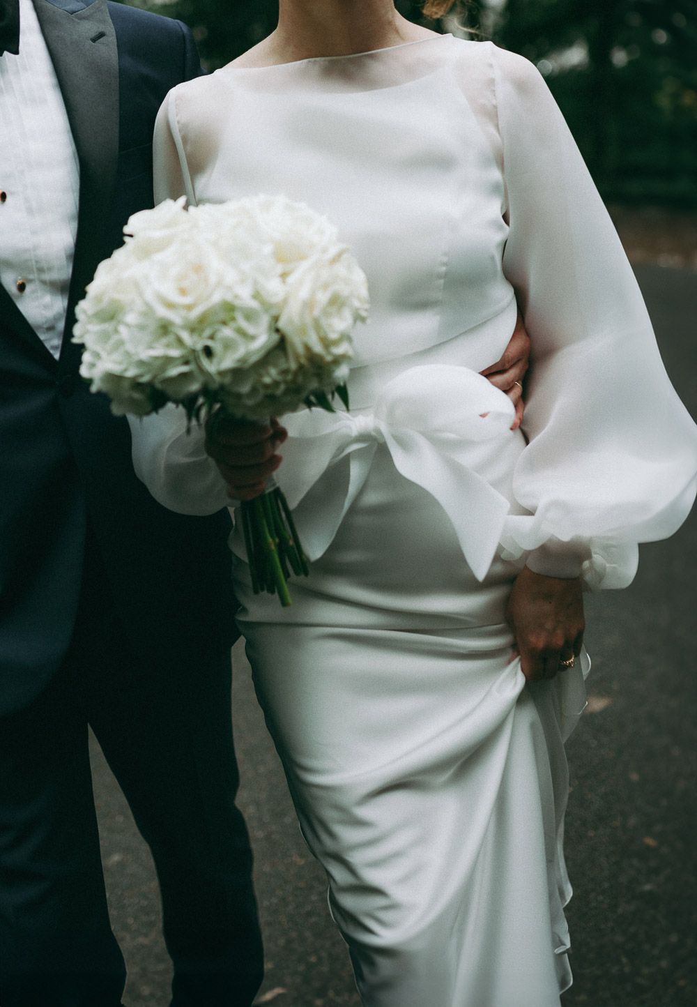 Detail shot of wedding dress with bow at nyc wedding