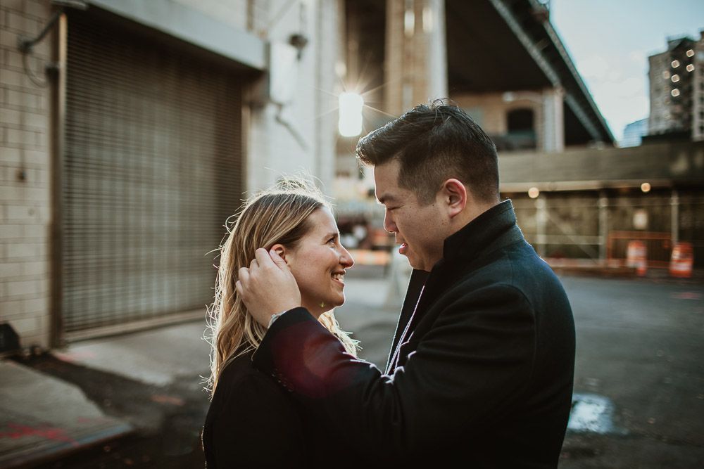 Couple during engagement photoshoot in dumbo brooklyn