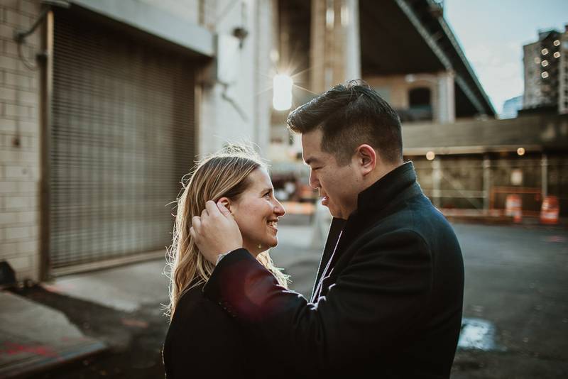 Couple during engagement photoshoot in dumbo brooklyn