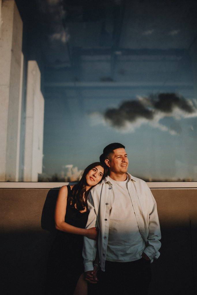 Couple during engagement photo session in williamsburg brooklyn