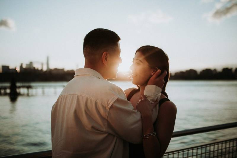 Couple during engagement photo session in williamsburg brooklyn