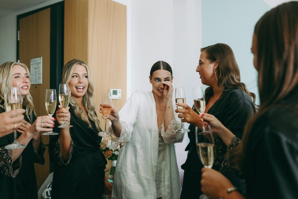 Bride and bridesmaids getting ready before wedding at the william vale