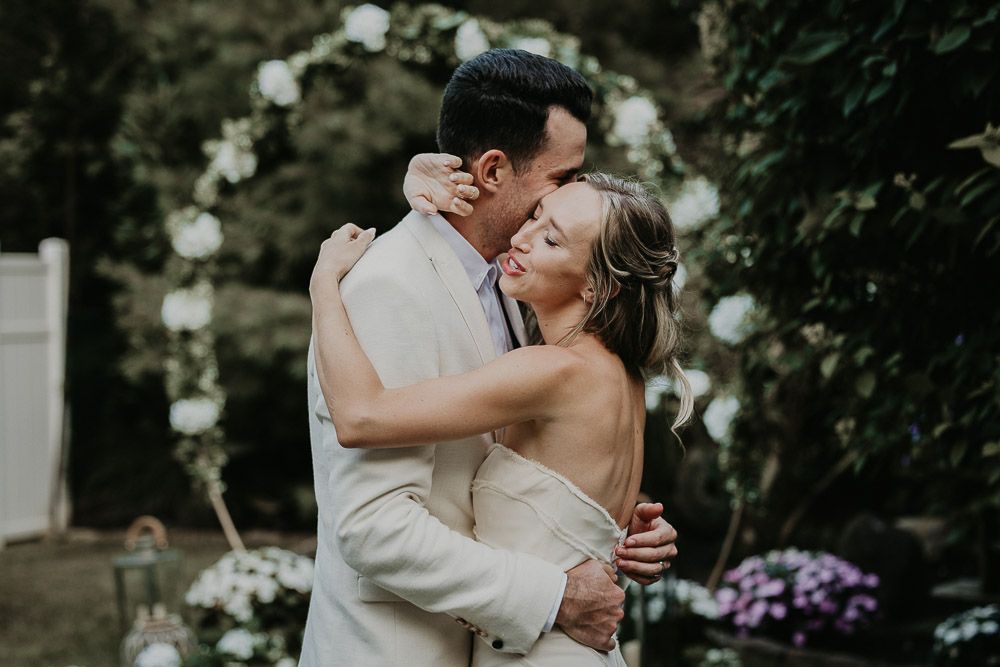 Bride and groom's first dance at hamptons backyard wedding