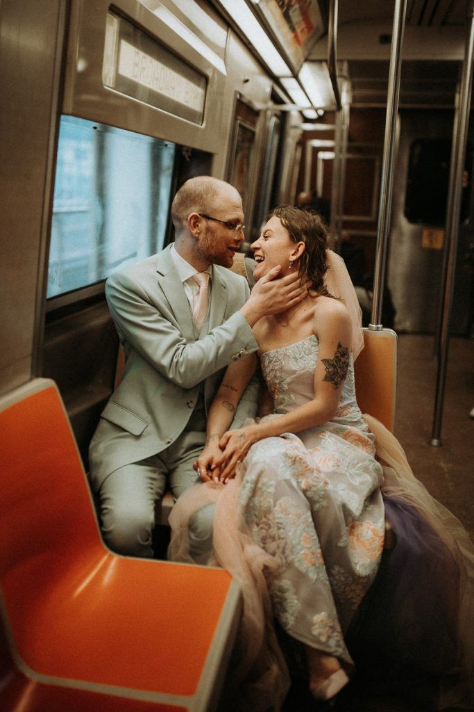 Bride and groom in nyc subway - by Lucie B. Photo brooklyn wedding photographer