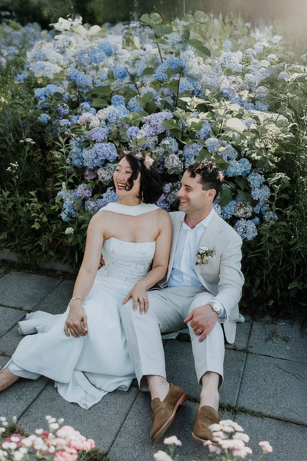 Bride and groom in flowers at brooklyn grange wedding