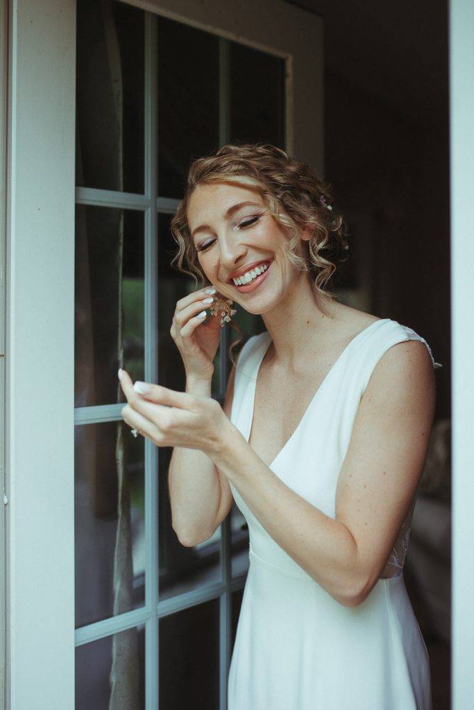Bride getting ready before hudson valley wedding