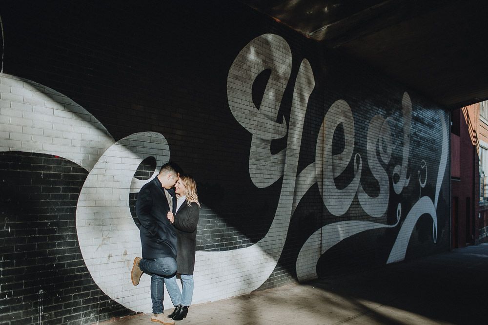 Couple during engagement photoshoot in dumbo brooklyn