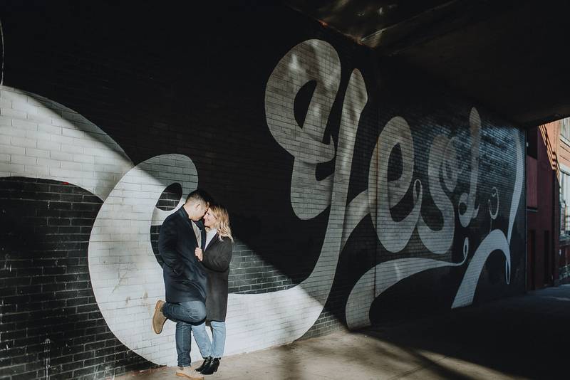 Couple during engagement photoshoot in dumbo brooklyn
