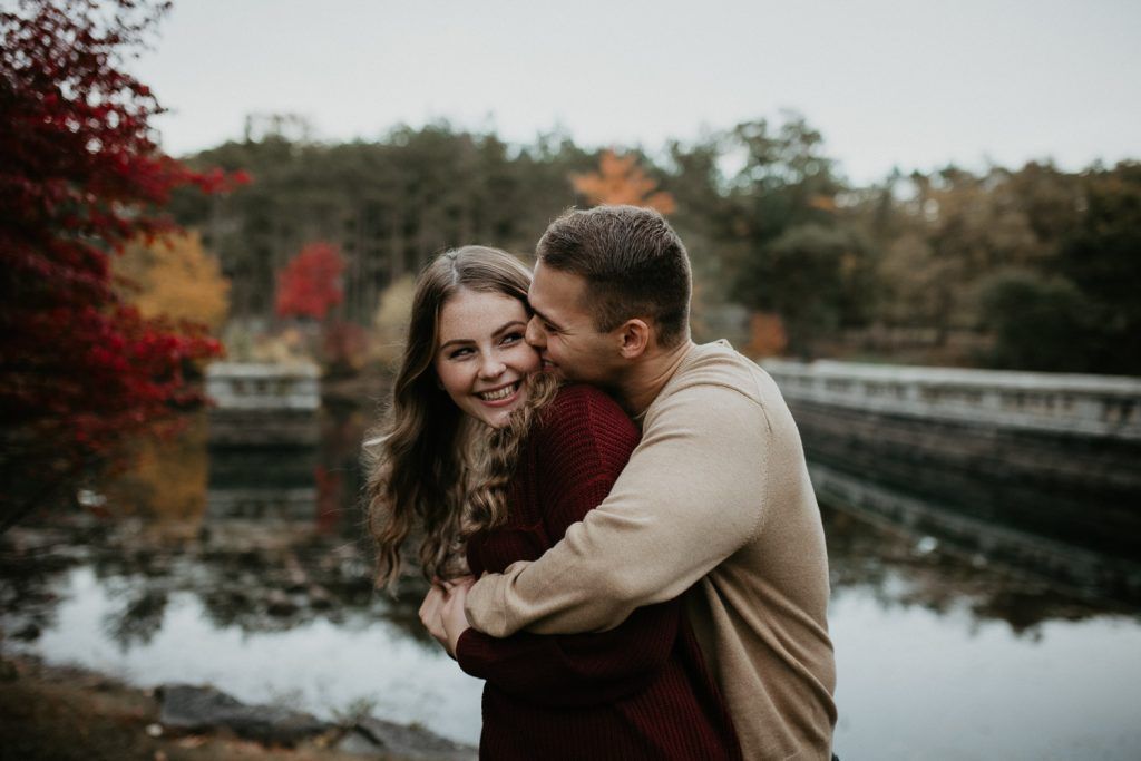 Couple during fall engagement photoshoot in west point