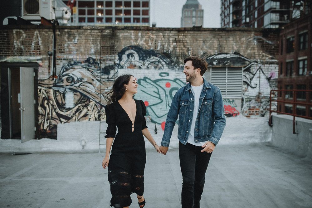 Couple on dumbo rooftop during brooklyn engagement session