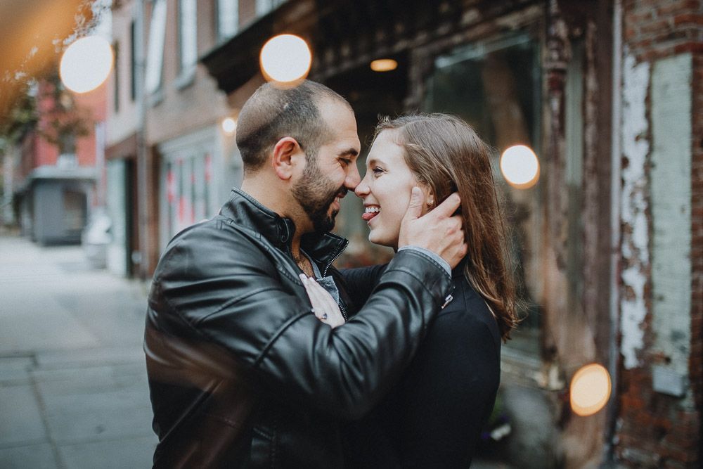 Couple during engagement photoshoot in red hook brooklyn