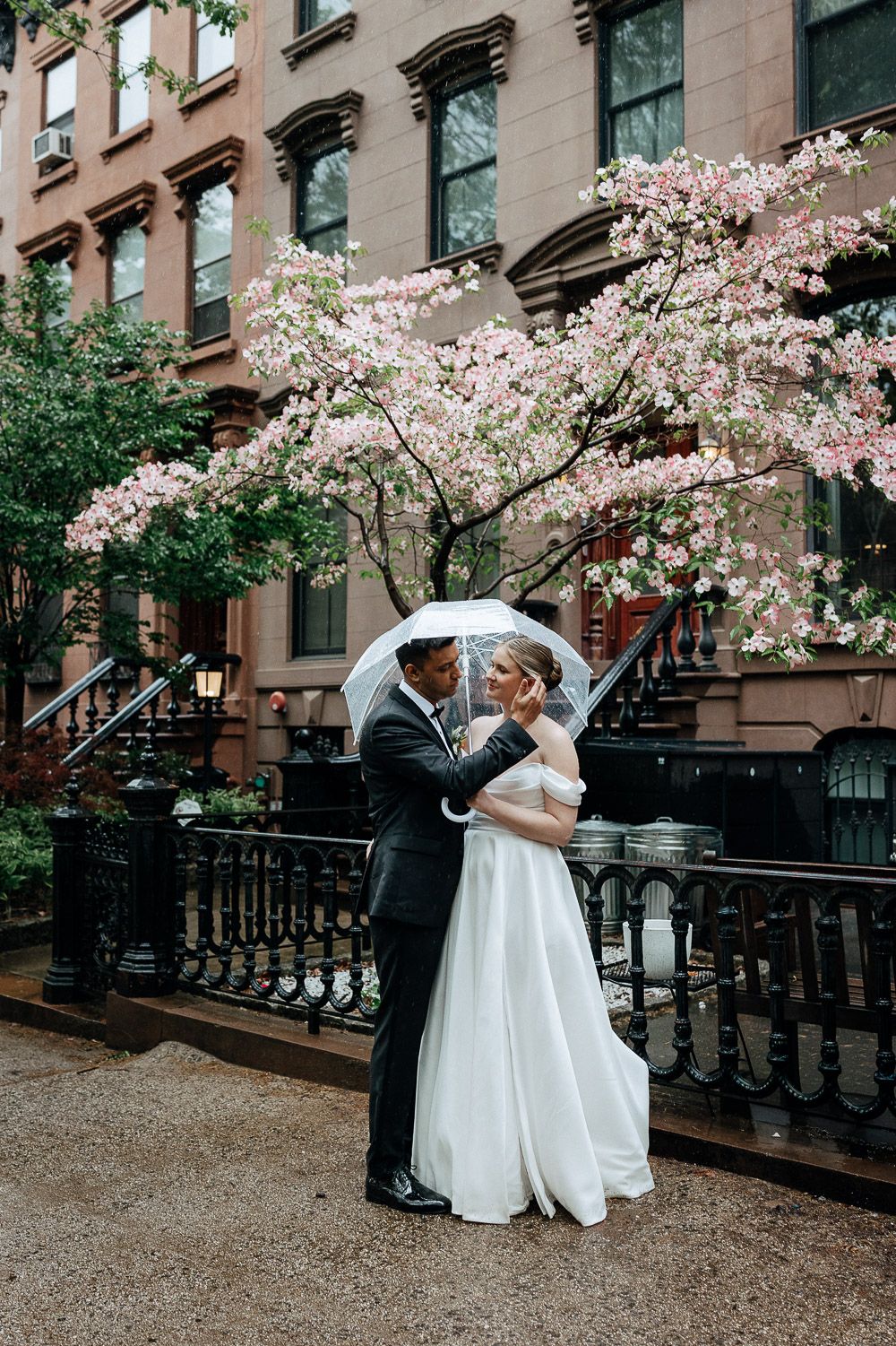 Rainy nyc wedding during cherry blossoms