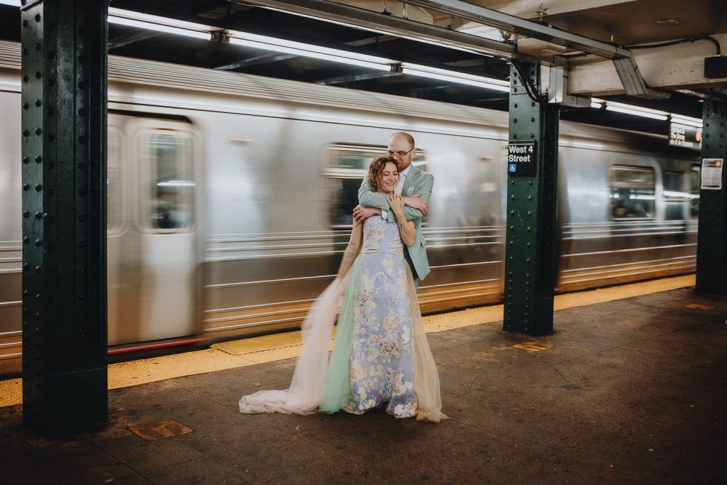Bride and groom in nyc subway - by Lucie B. Photo brooklyn wedding photographer