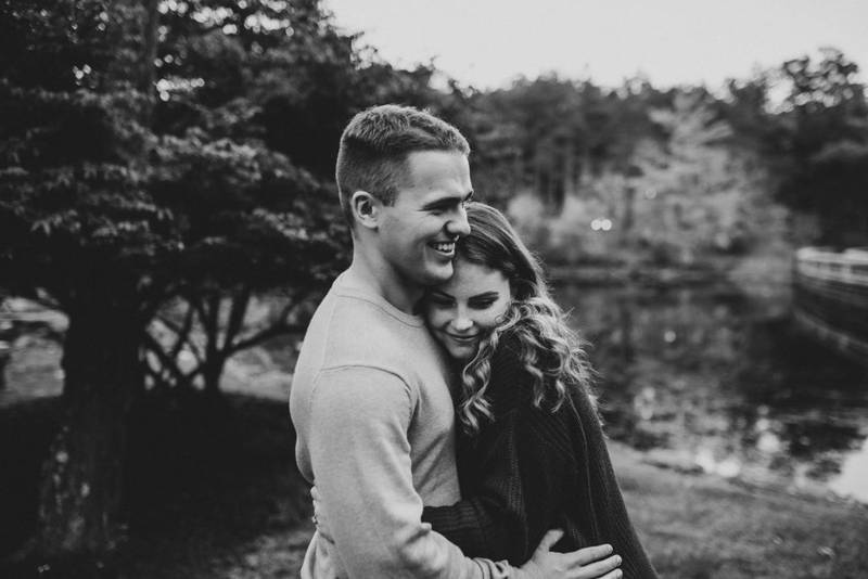 Couple during fall engagement photoshoot in west point