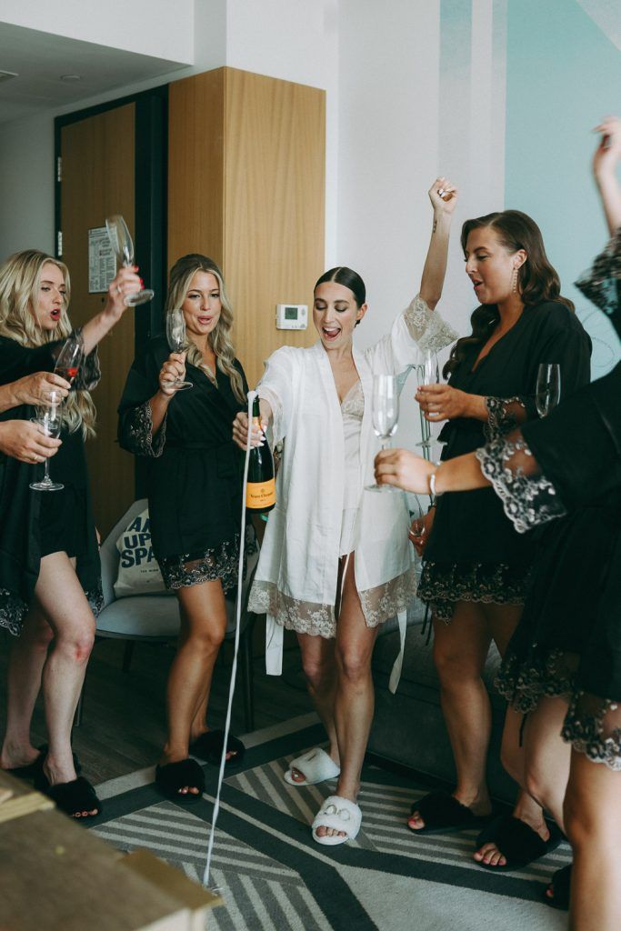 Bride and bridesmaids getting ready before wedding at the william vale