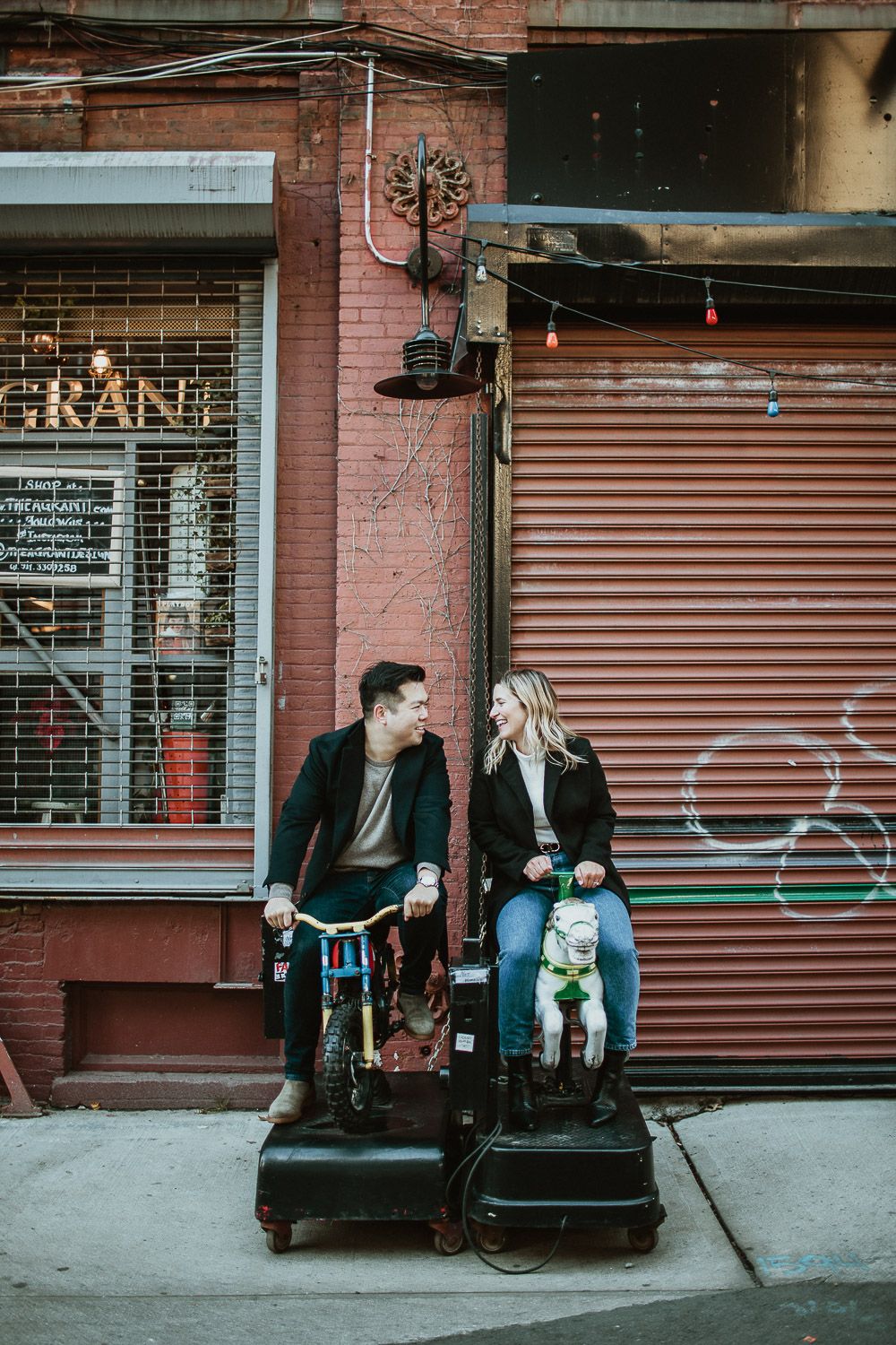 Couple during engagement photoshoot in dumbo brooklyn