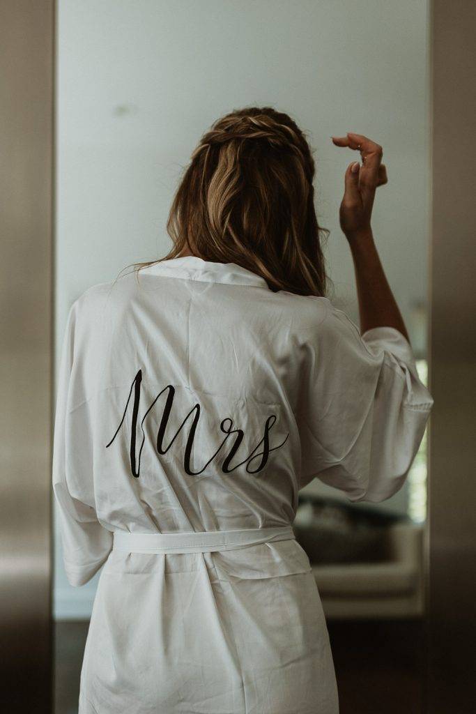 Bride getting ready before backyard wedding in the hamptons