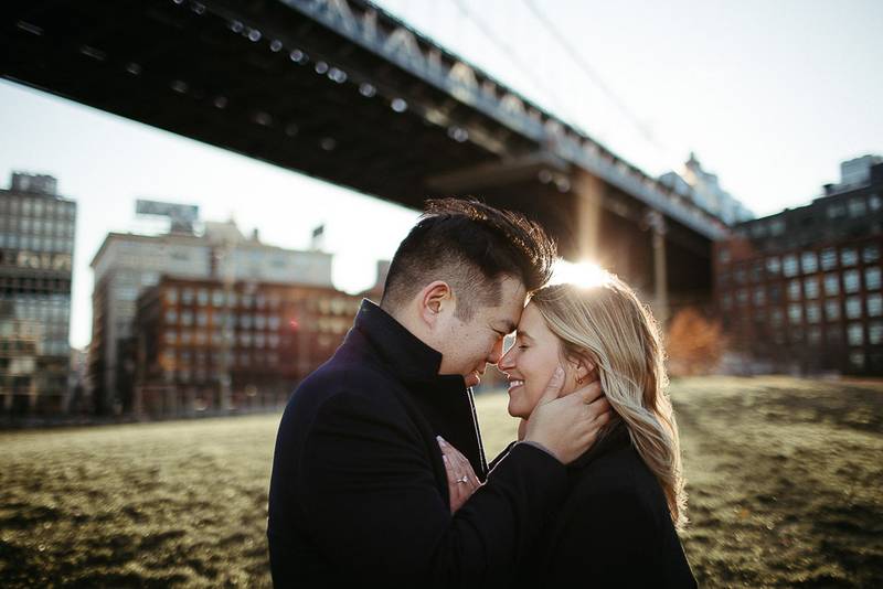 Couple during engagement photoshoot in dumbo brooklyn