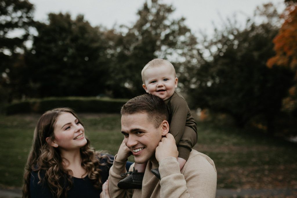 Parents and baby during fall family session in west point